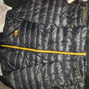 The North Face Black Puffer Jacket with Yellow Accents